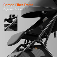 Black stroller with carbon fiber frame feature highlighted on a gray background