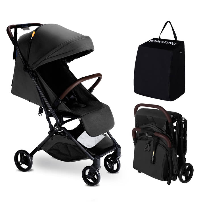 Black stroller with matching bag and backpack on a white background