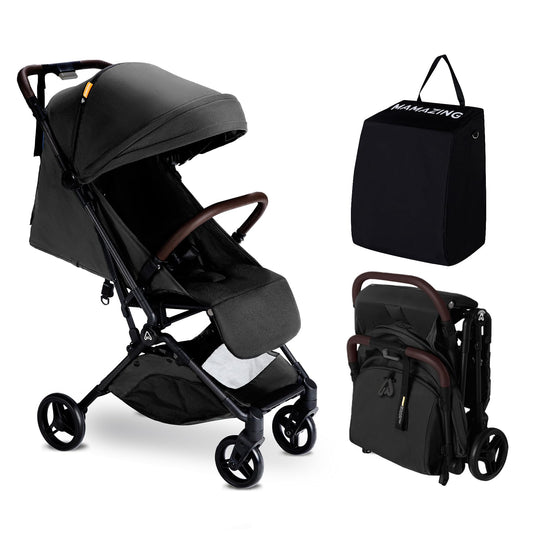 Black stroller with matching bag and backpack on a white background